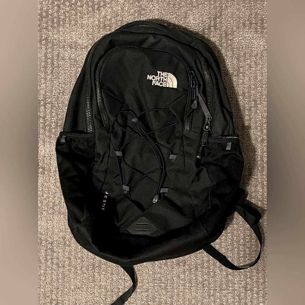 LIKE NEW North Face Jester Backpack with reflective patches